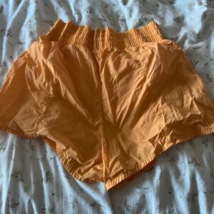 Bright orange athletic shorts